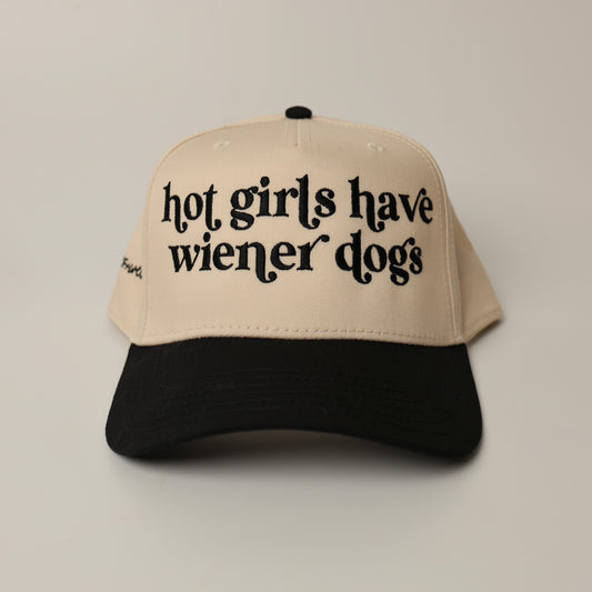 Beige and black woof+ween hat with text 'hot girls have wiener dogs'