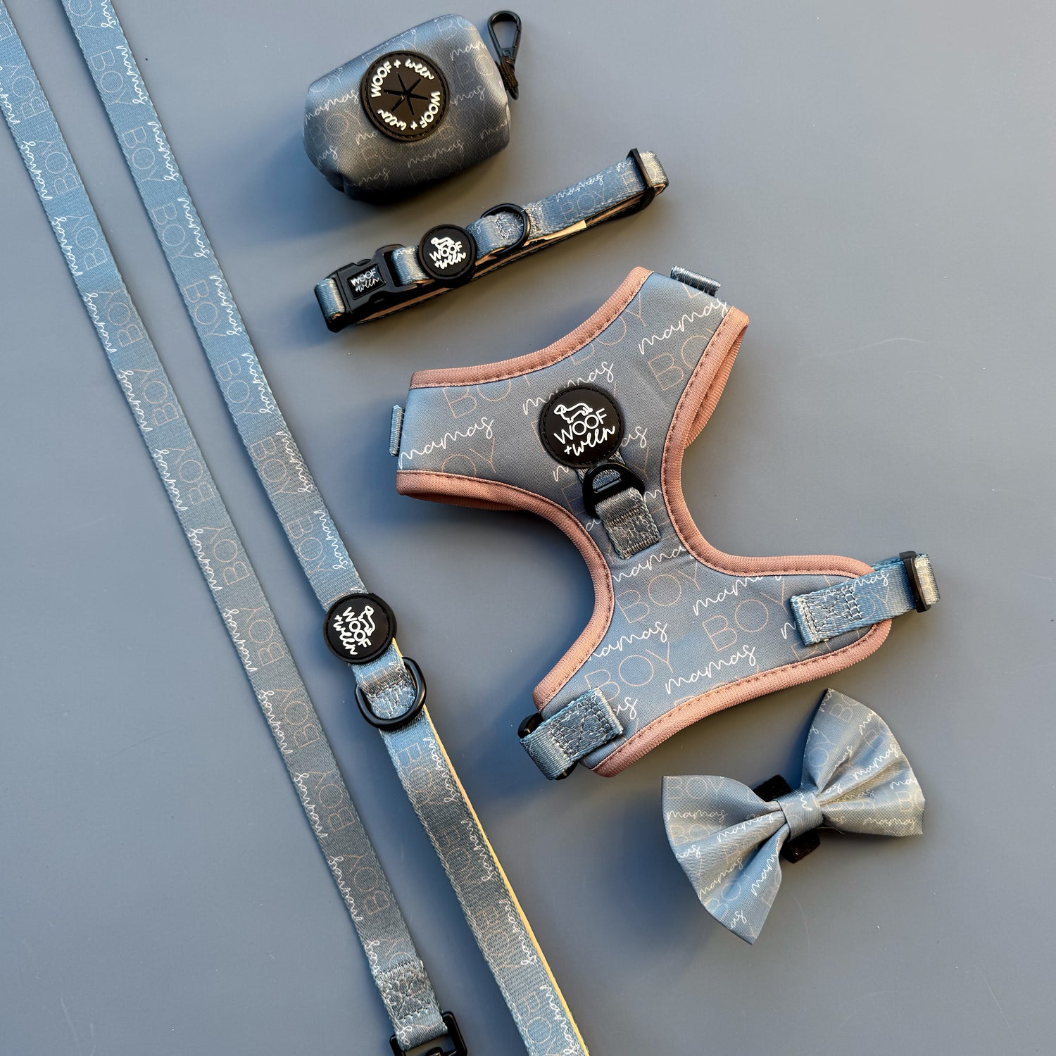 MAMAS BOY THEME Dog accessories including a DOG harness, collar, and bow tie in a mamas boy print design