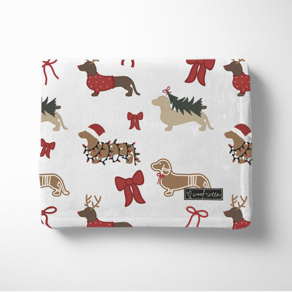 Dachshund Christmas blanket with bows and doxies