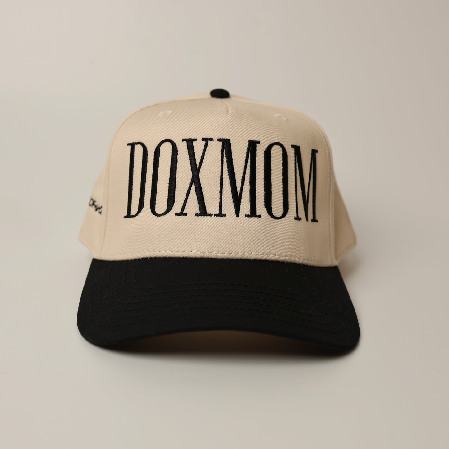 Beige woof+ween hat with 'DOXMOM' text