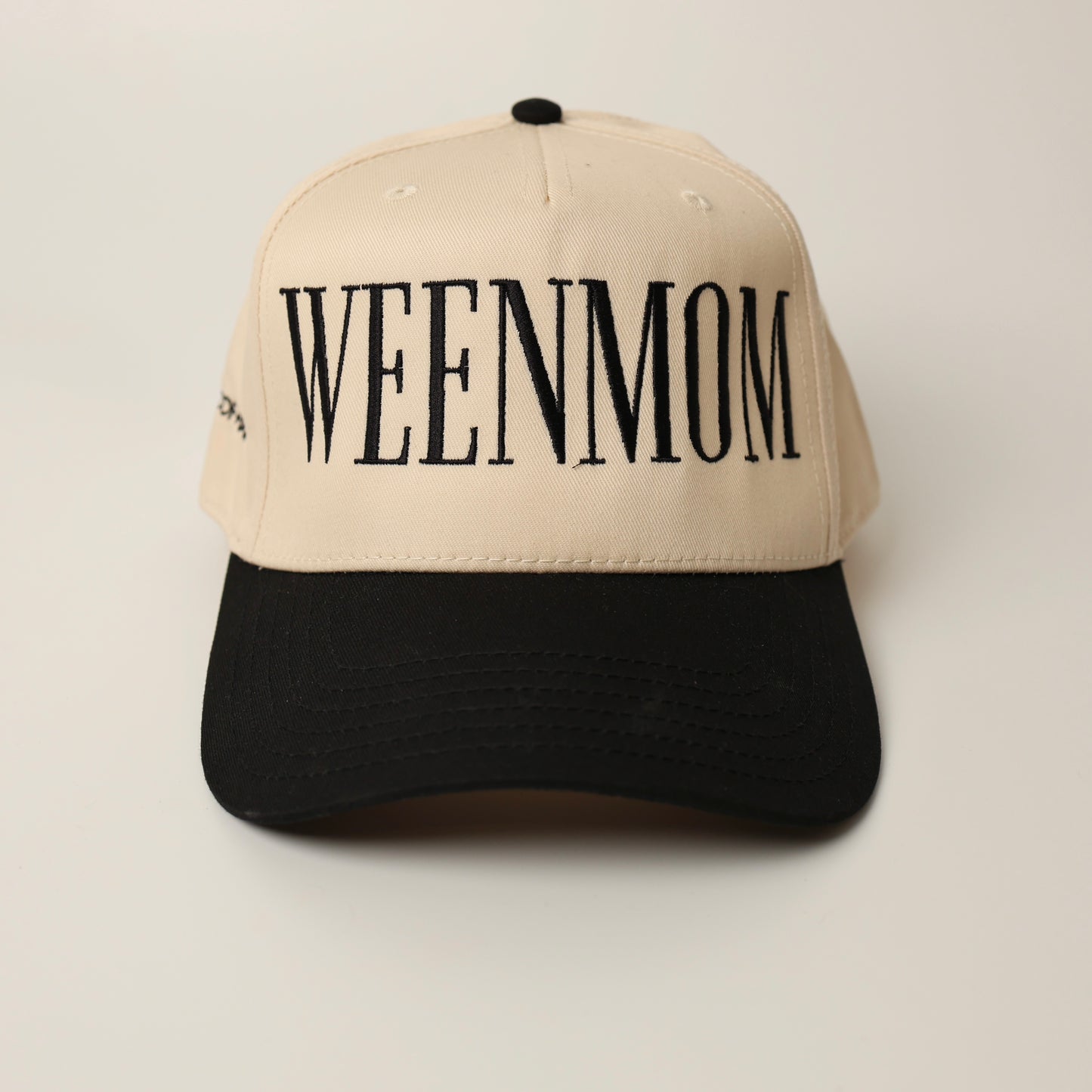 Beige and black woof+ween hat with 'WEENMOM' text 