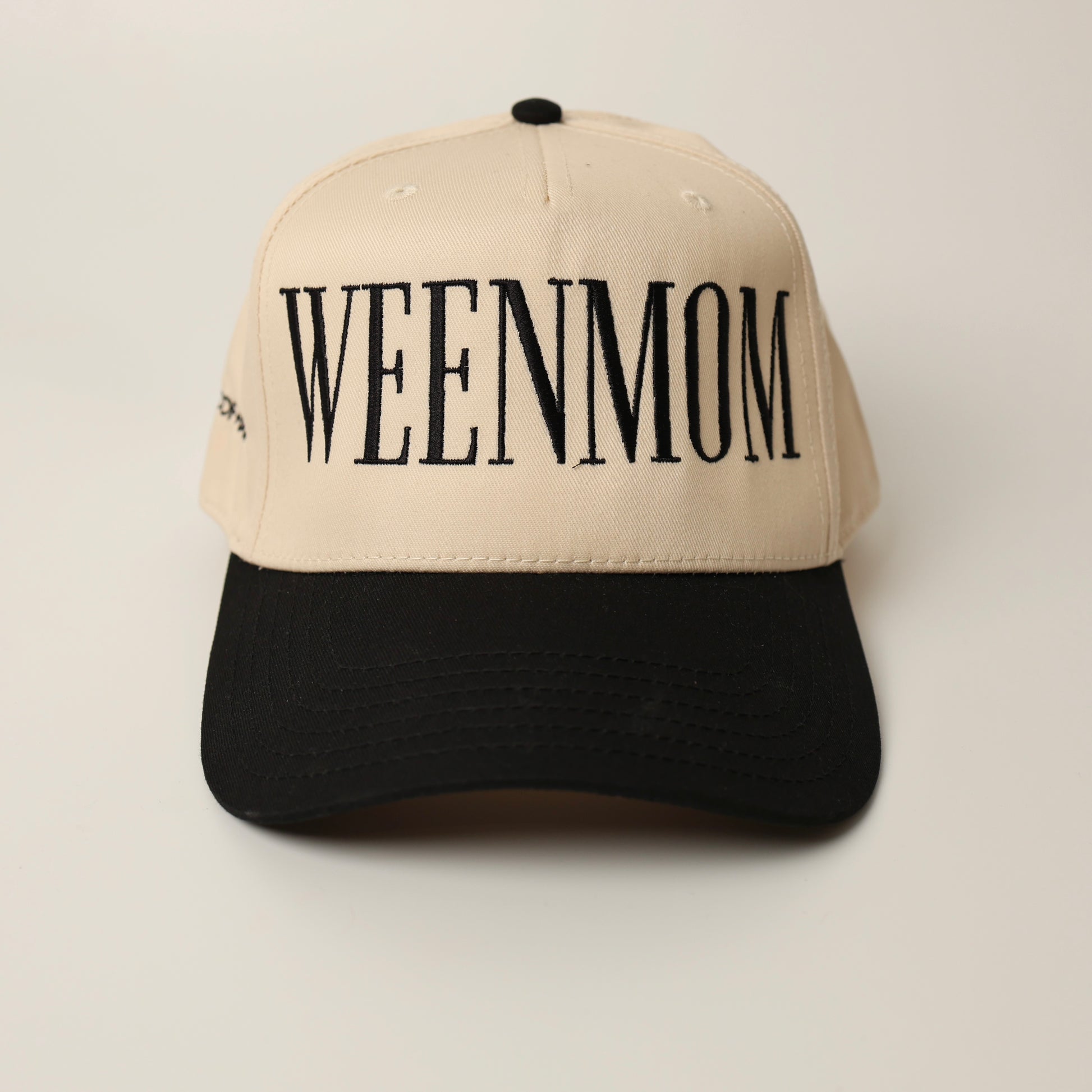 Beige and black woof+ween hat with 'WEENMOM' text 