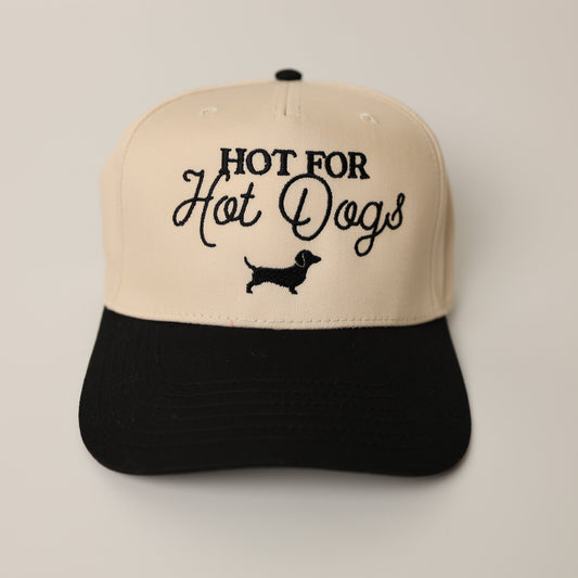 Dachshund Cap with 'Hot for Hot Dogs' text and dachshund graphic on a beige and black background