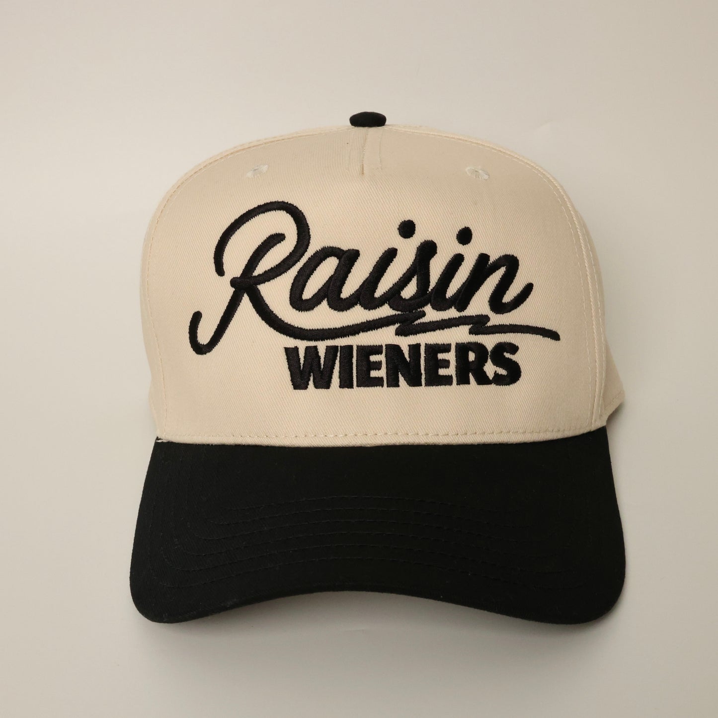 Beige and black dachshund cap with 'Raisin Wieners'