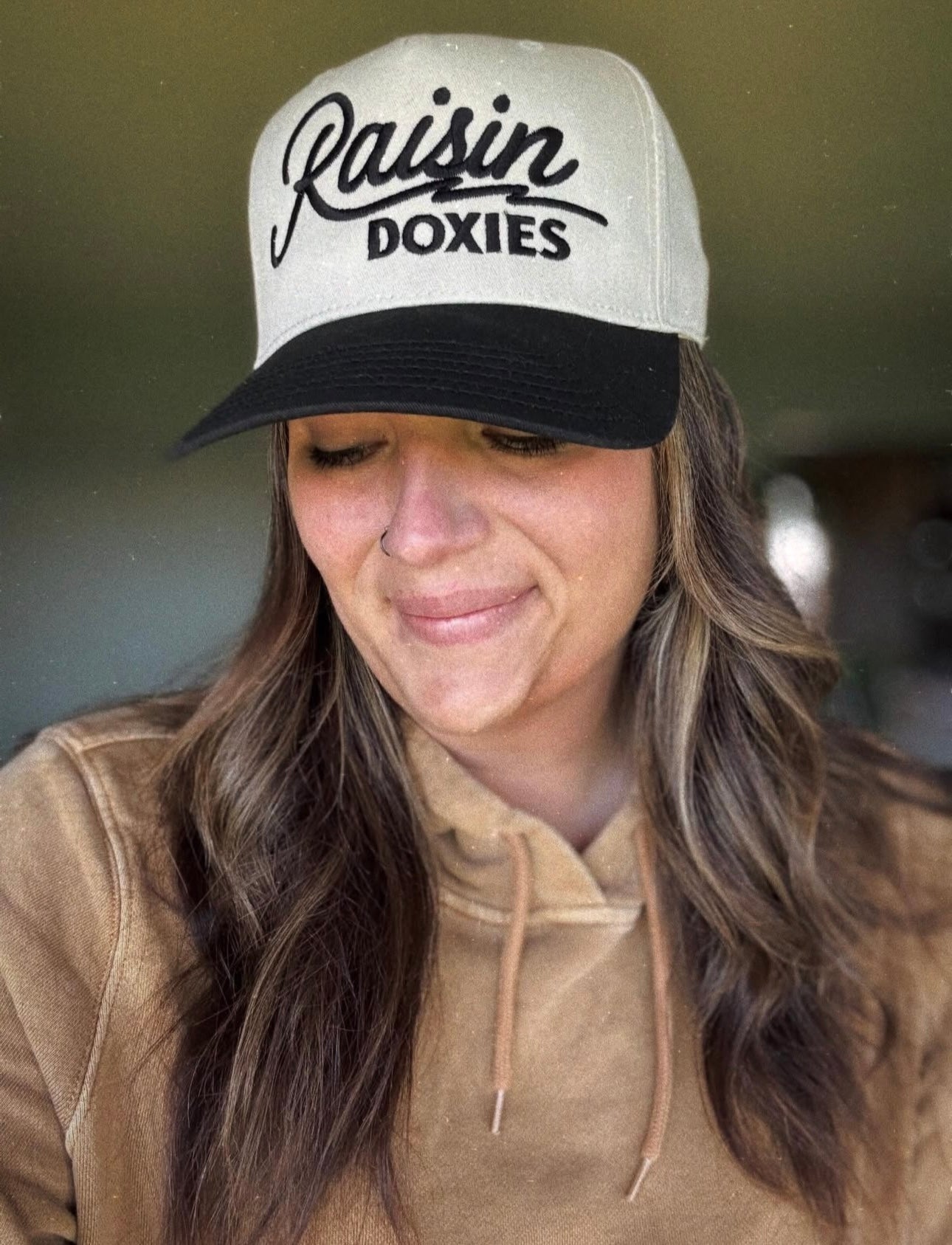 Raisin doxies embroidered ball cap worn by customer