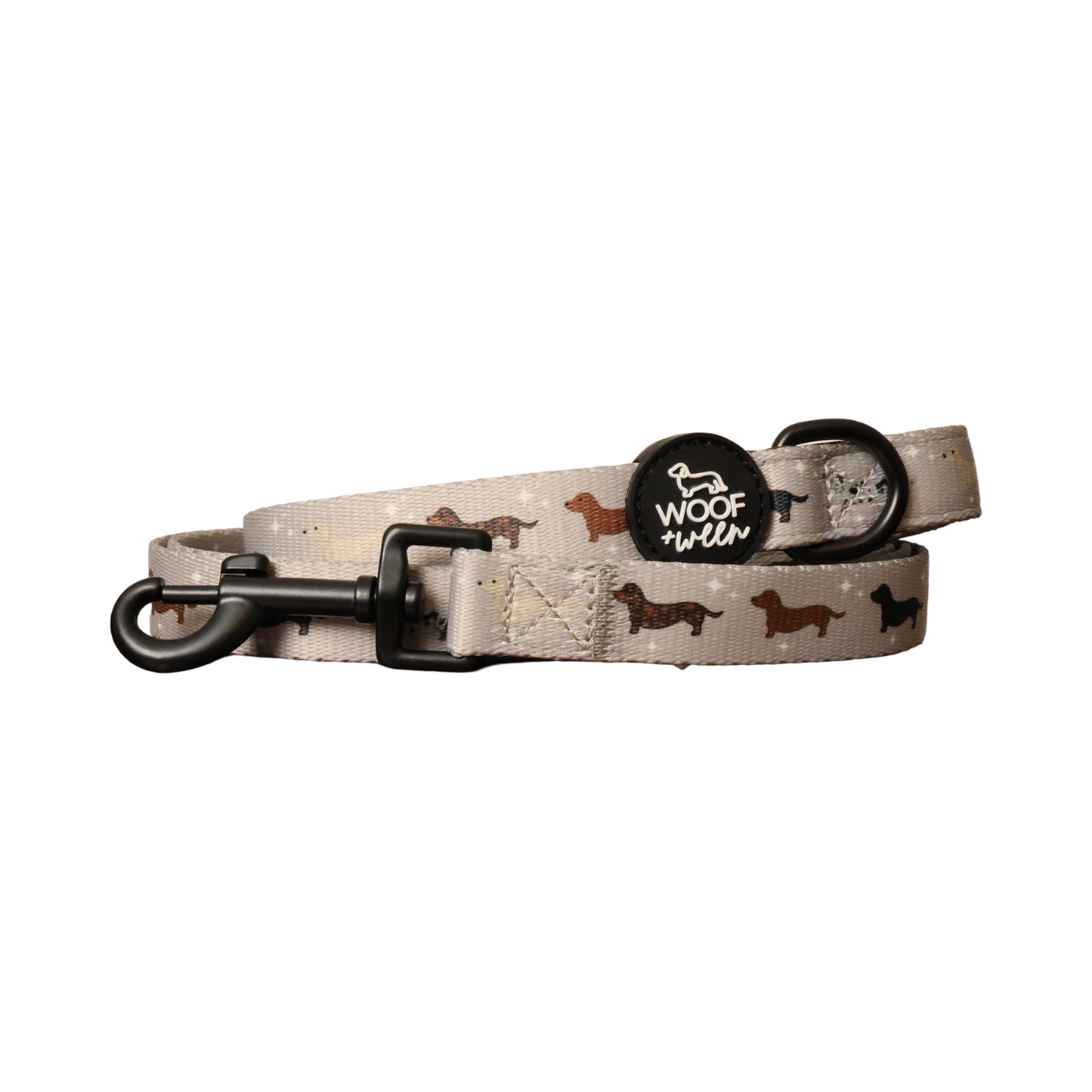 Dachshund leash from woof and ween with doxies and wiener dogs on tan dog leash