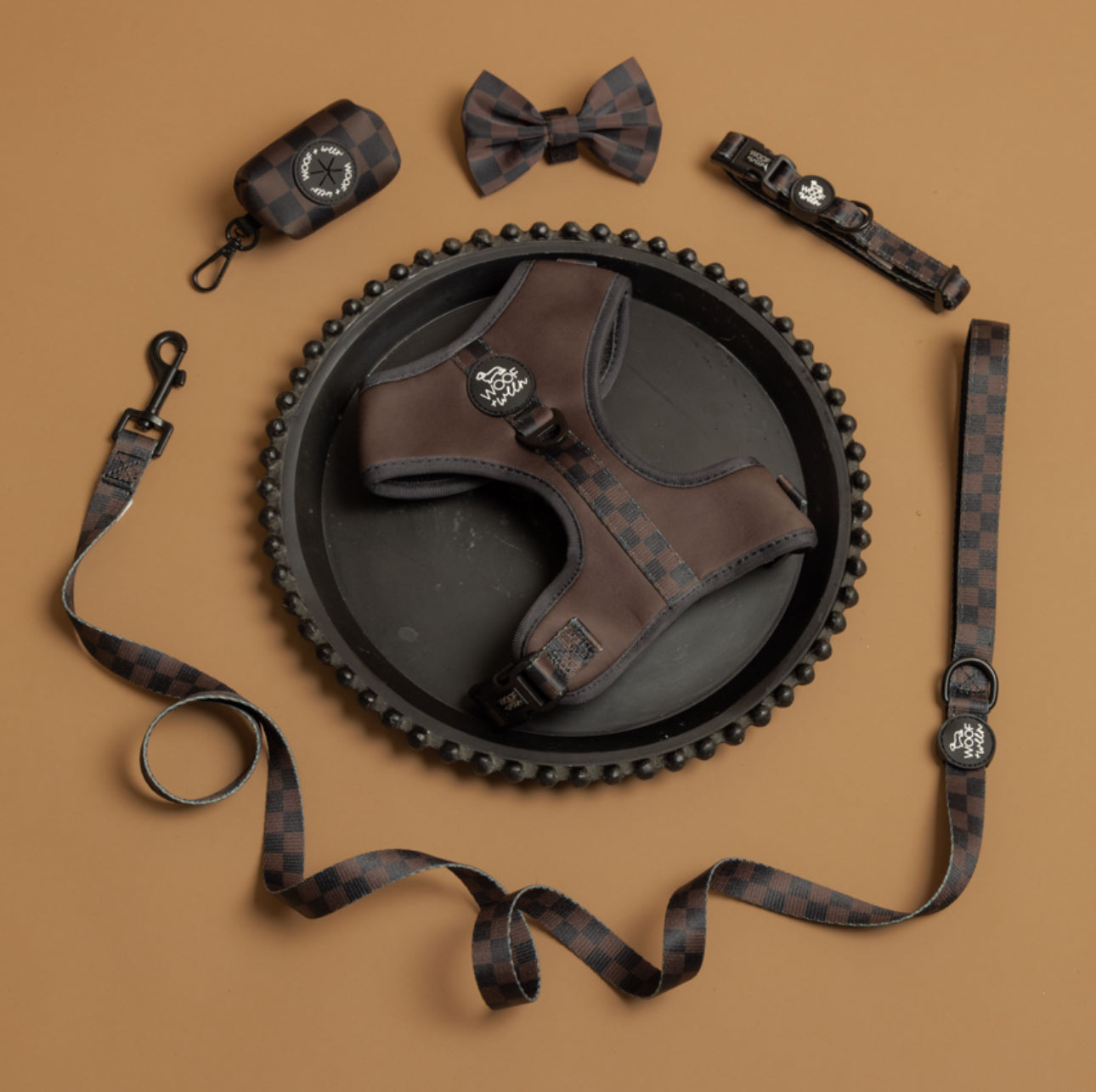 Dog accessories including a harness, leash, collar, and bow tie  brown checkered