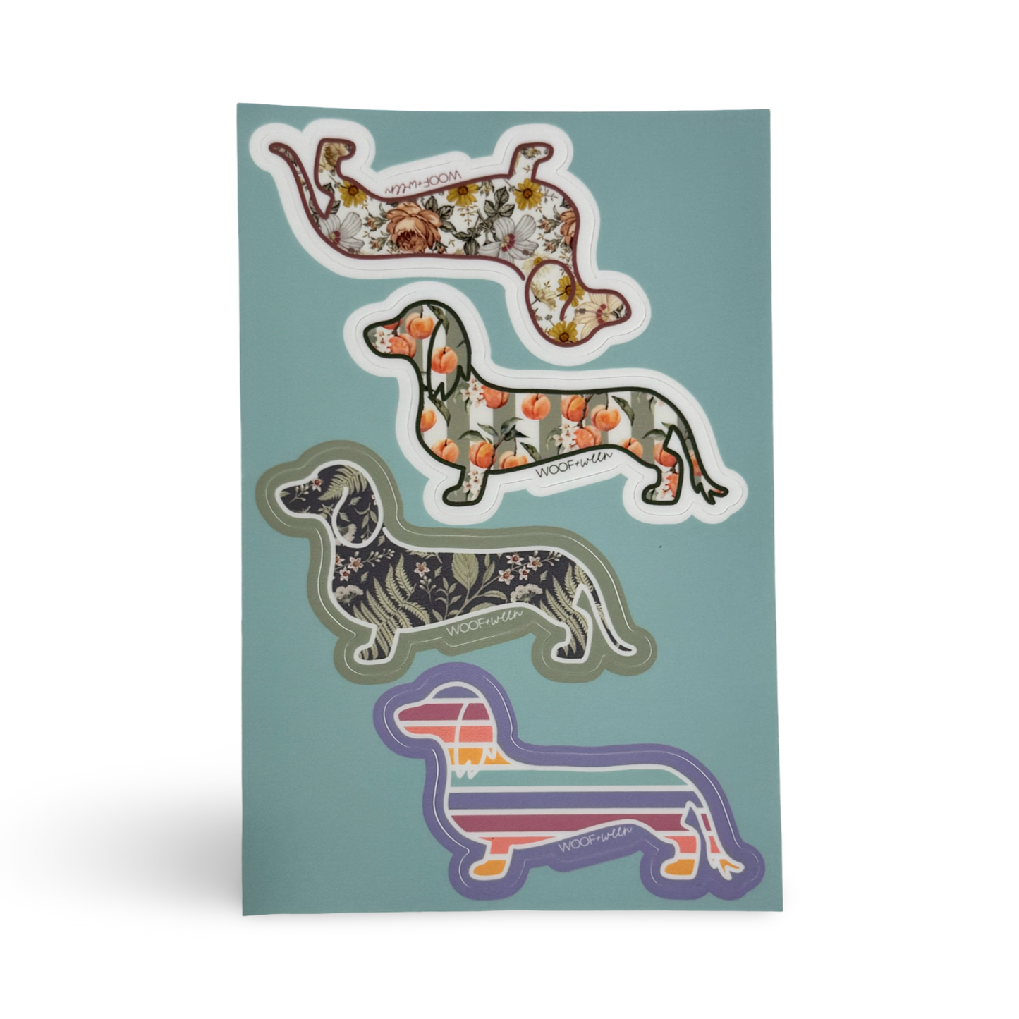 Girly dachshund sticker sheet with four cute doxie decals