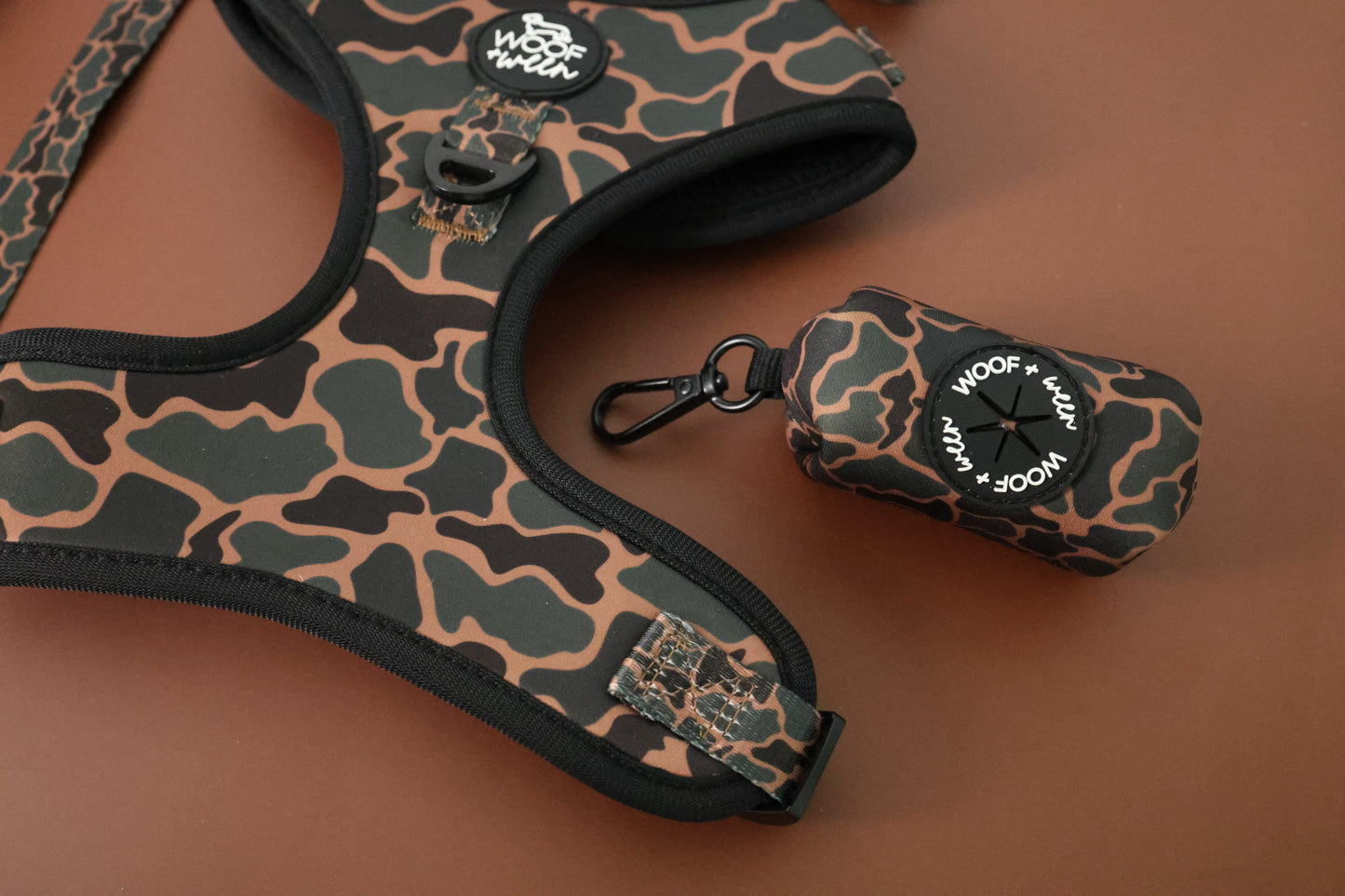 Doxie leash with Black Duck Camo waste bag holder attached