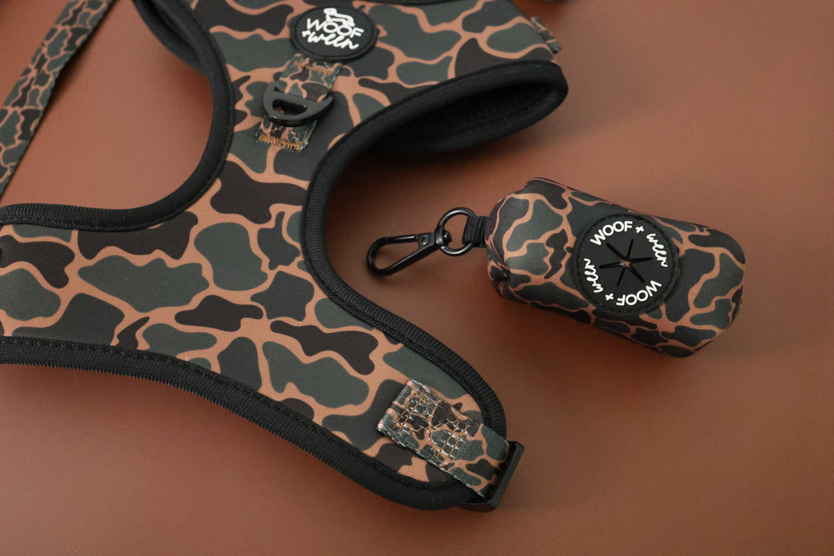 Doxie leash with Black Duck Camo waste bag holder attached