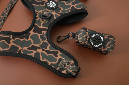 Doxie leash with Black Duck Camo waste bag holder attached