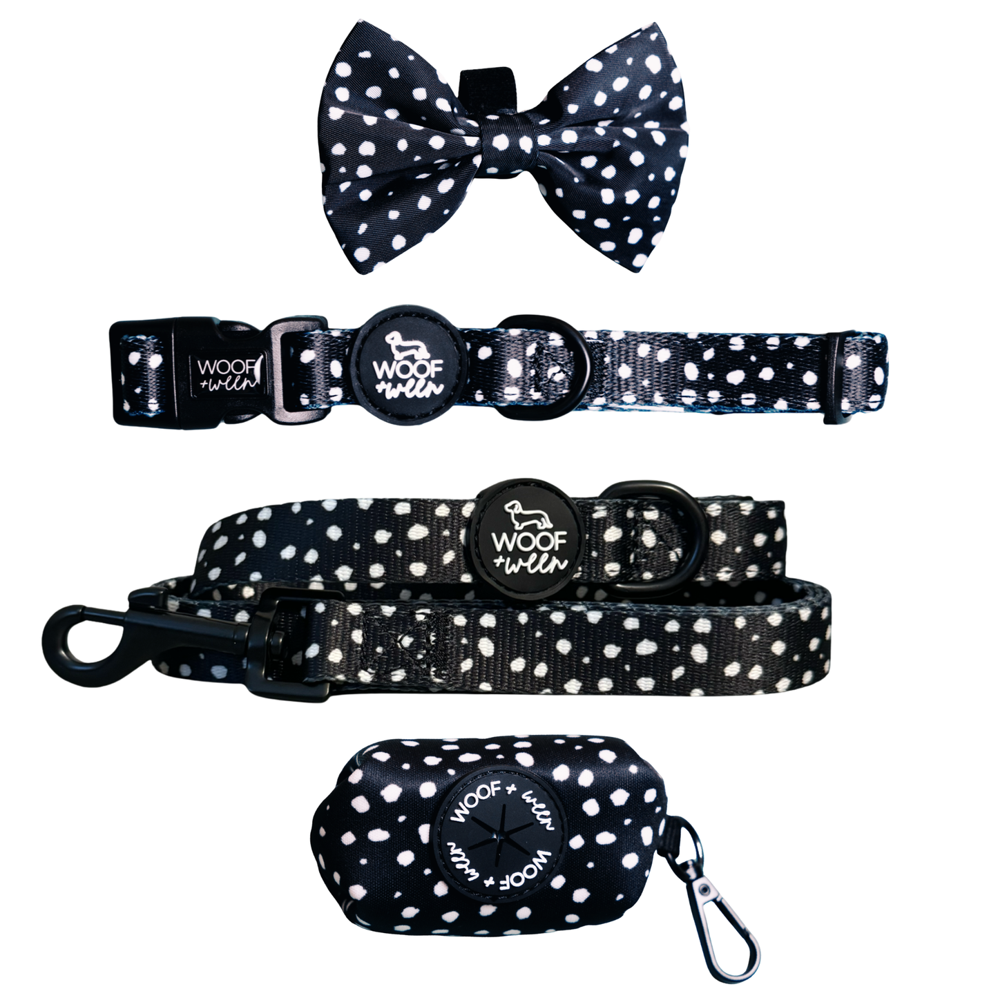 Black and white polka dot dog collar, bow, leash and waste bag holder accessory bundle