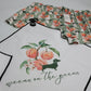 Peach Doxie golf towel clipped to golf bag